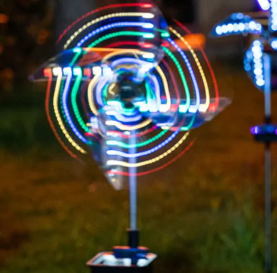 Solar wind spinner light with LED and IP65 rating, featuring spinning windmill decoration for garden paths in four colour options