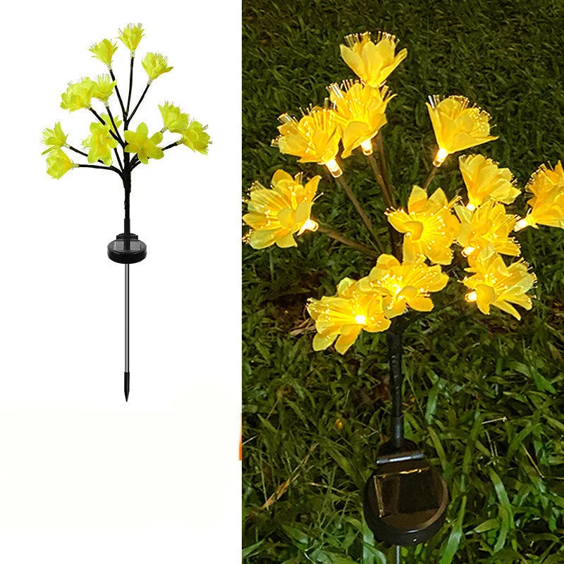 LED solar simulation camellia lawn lamp in garden setting, available in pink or yellow, IP65 rated, 720mm tall