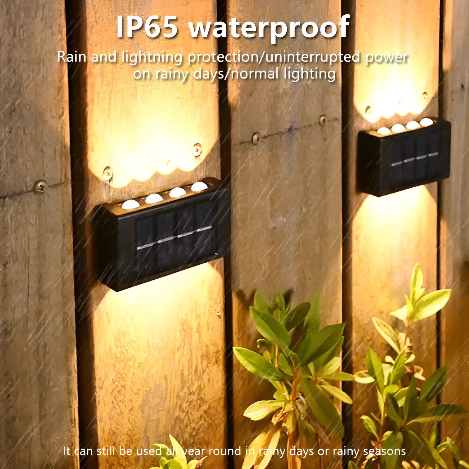 Black solar outdoor garden wall light with up and down glowing effect on a brick wall at night