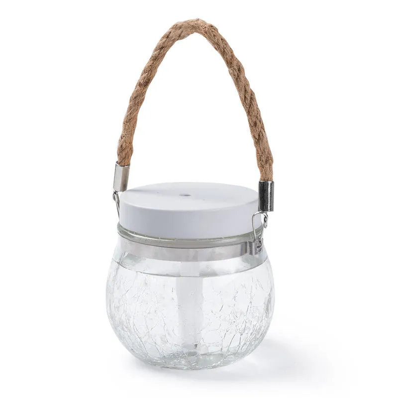 Round desktop USB humidifier in white plastic and glass with heavy fog output