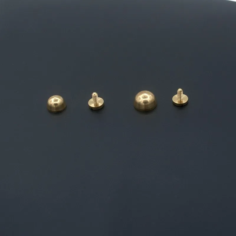 Brass decorative buckle showing round and bucket foot nail styles in 10x6mm and 12x7mm sizes