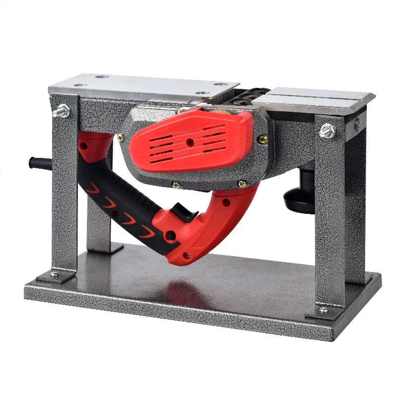 Red aluminium electric wood planer with 82mm width on workbench