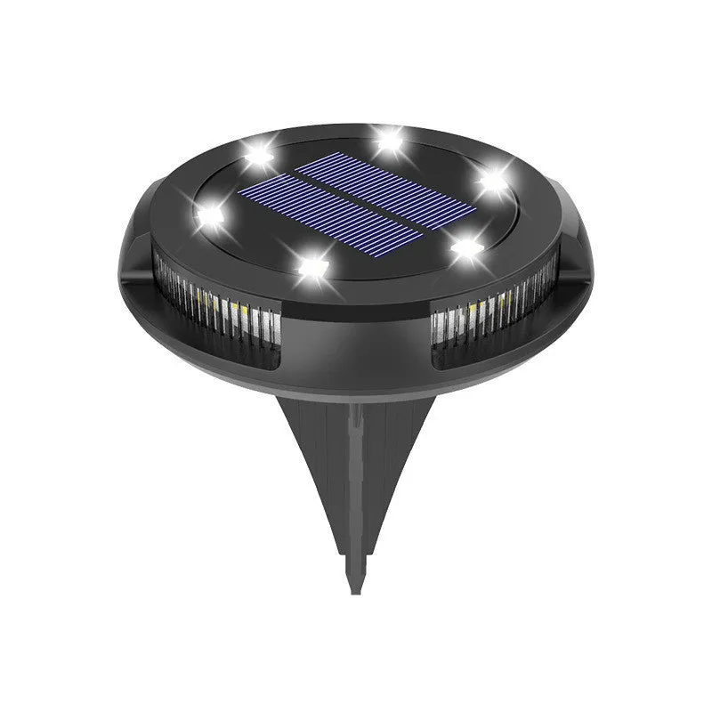 LED solar underground lawn light 11x4x13cm black ABS PP with seven colour changing cold white light on grass at dusk