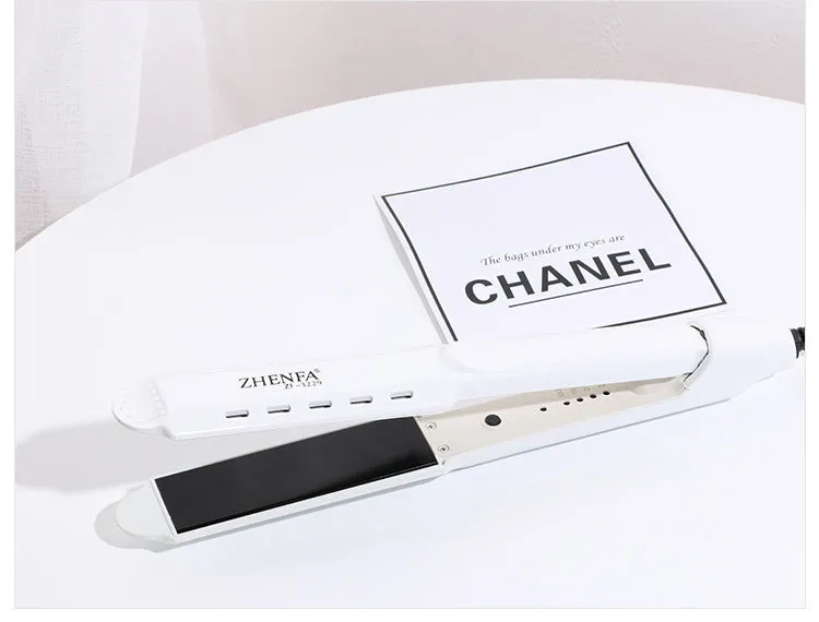 Gold wet dry curling iron with 15mm barrel and push button switch on white background