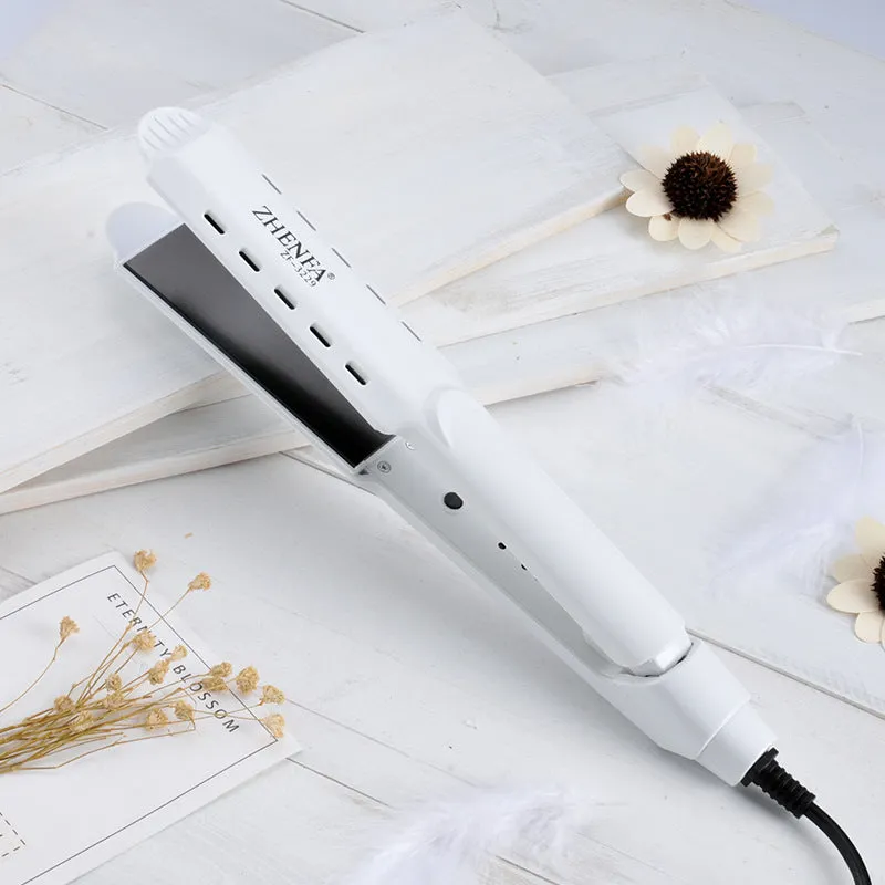 Gold wet dry curling iron with 15mm barrel and push button switch on white background