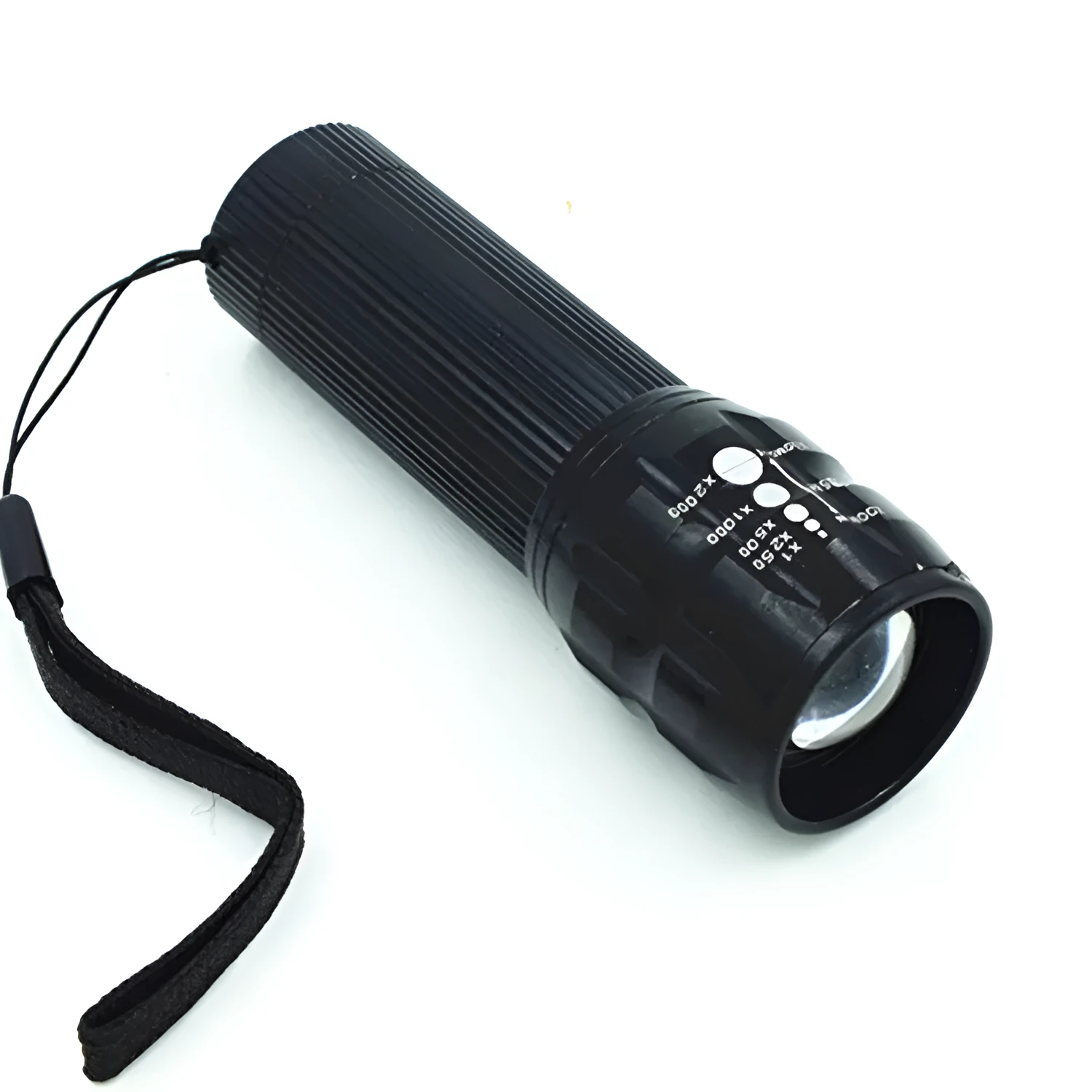 Black mini LED flashlight with telescopic head and tail push button switch on plain background