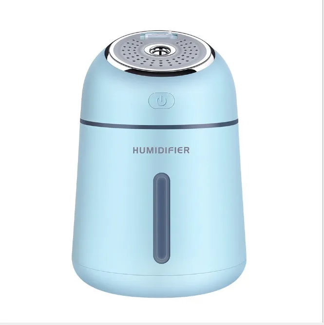 Mini ultrasonic USB humidifier 330ml in blue on desk with fan and LED light