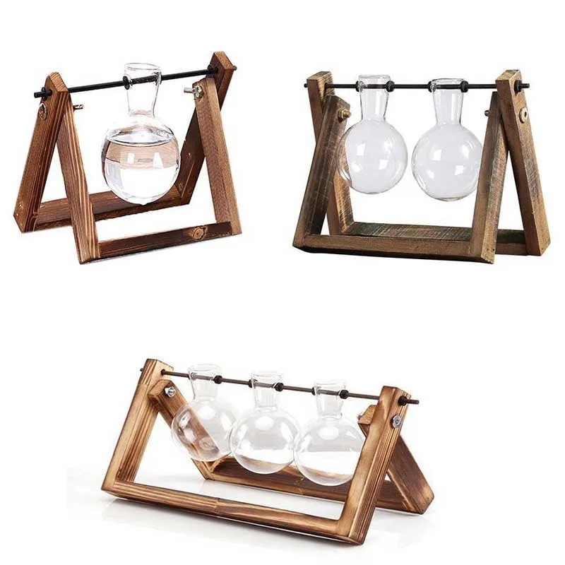 Glass plant terrarium with wooden stand, geometric shape, Chinese style, on a desk