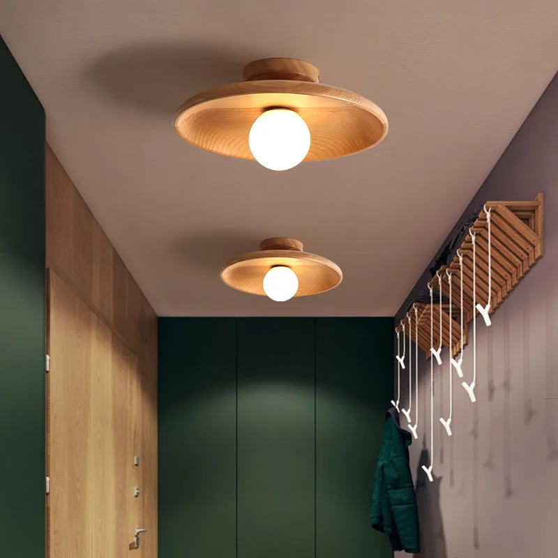 Modern minimalist ceiling lamp with solid wood body and glass shade in wood or walnut colour.