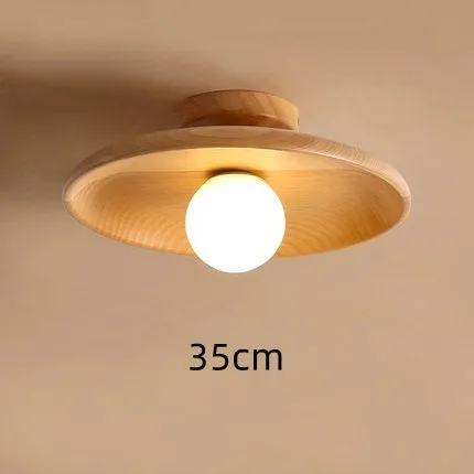 Modern minimalist ceiling lamp with solid wood body and glass shade in wood or walnut colour.