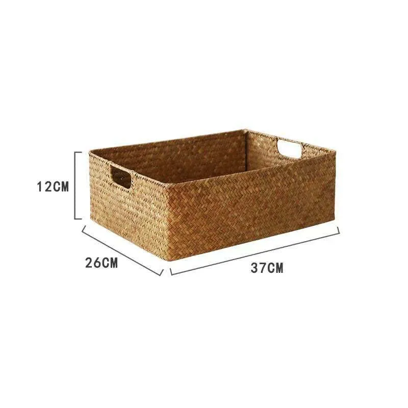 Handmade straw woven rectangular storage basket in natural grass fibre on a shelf
