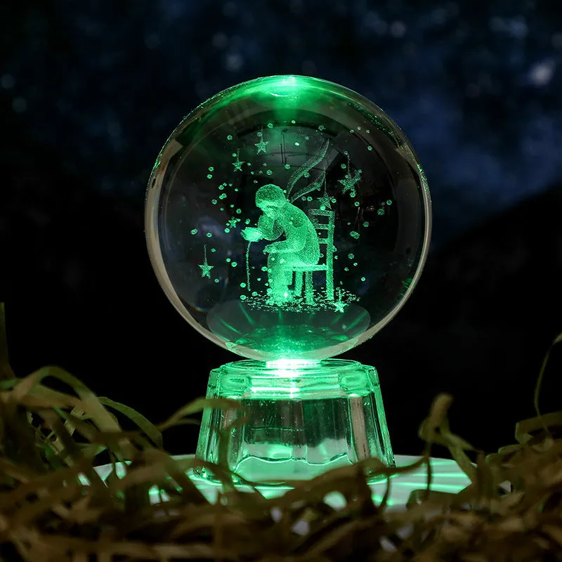 Transparent white crystal ball ornament with inner carving on a fixed base.