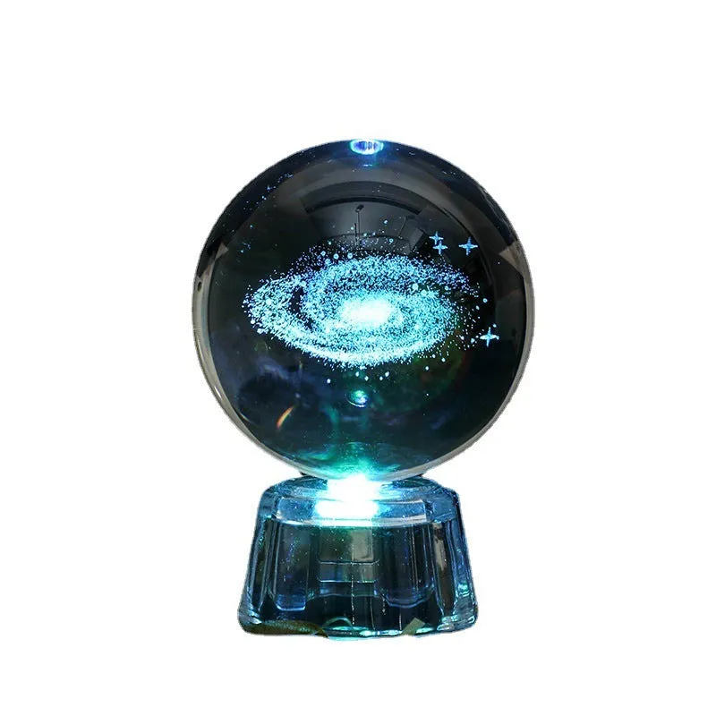 Transparent white crystal ball ornament with inner carving on a fixed base.