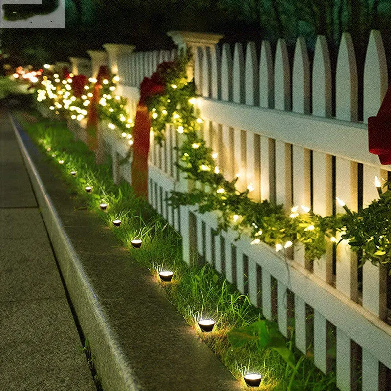 Solar flower pot LED lawn light with IPX4 waterproof rating, 0.2W, warm or white light, placed in garden