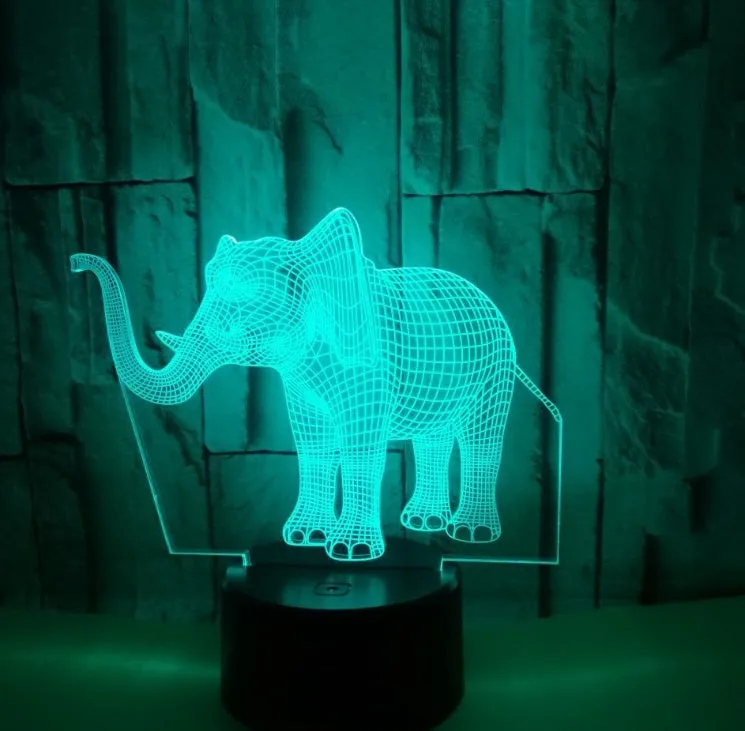 3D LED elephant touch lamp showing seven colour modes on a wooden desk