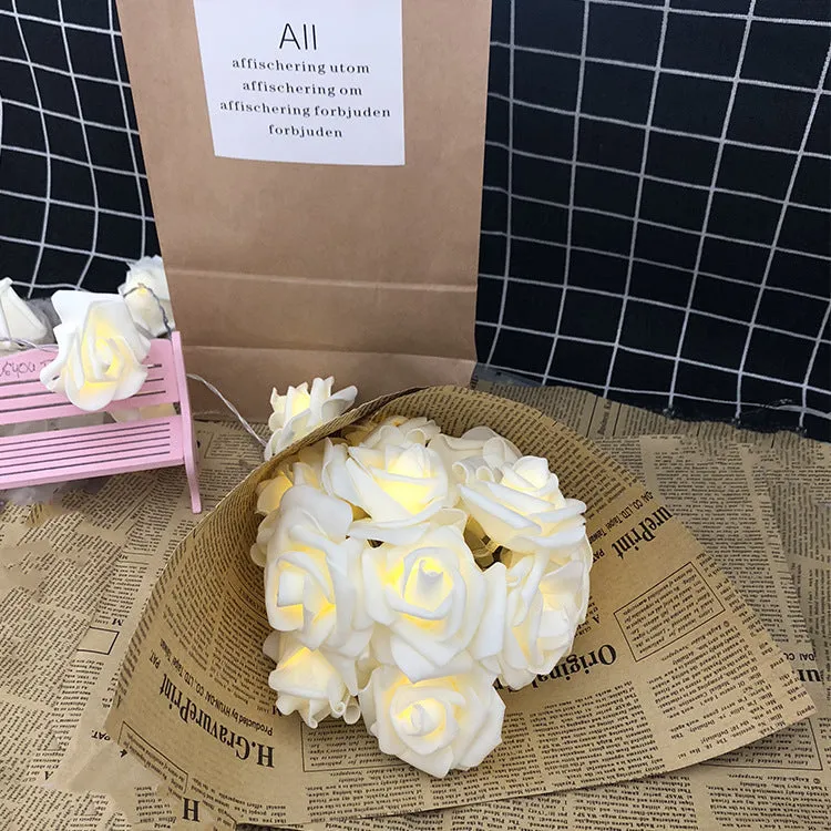 PE rose flower light string with 20 LED roses in white and pink on a dark background, 3 metre length for romantic decor