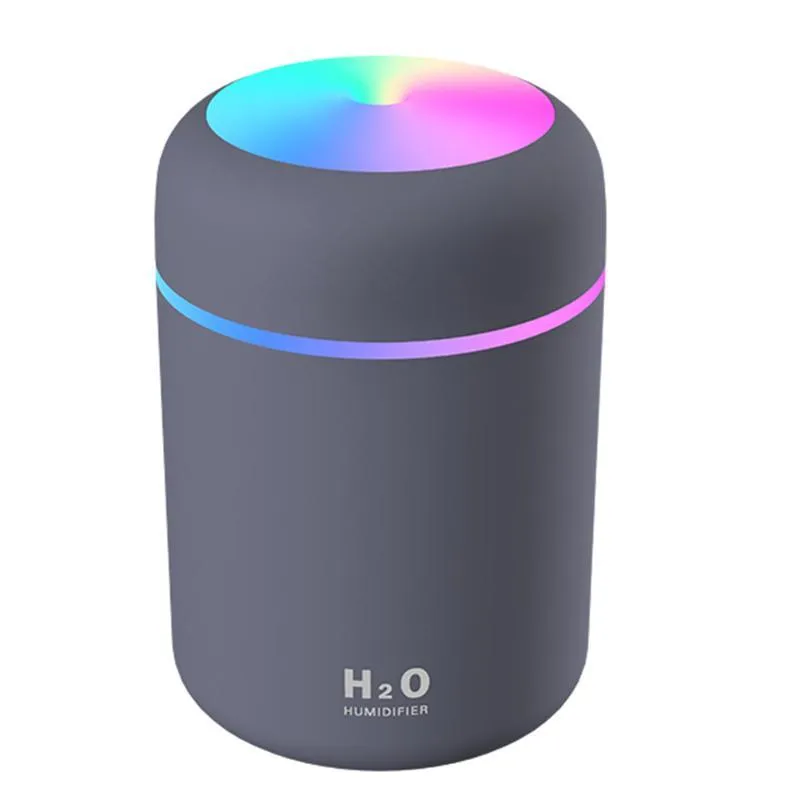 Car USB cup air humidifier with 300ml tank, two spray modes, colourful atmosphere light, in pink colour on desk