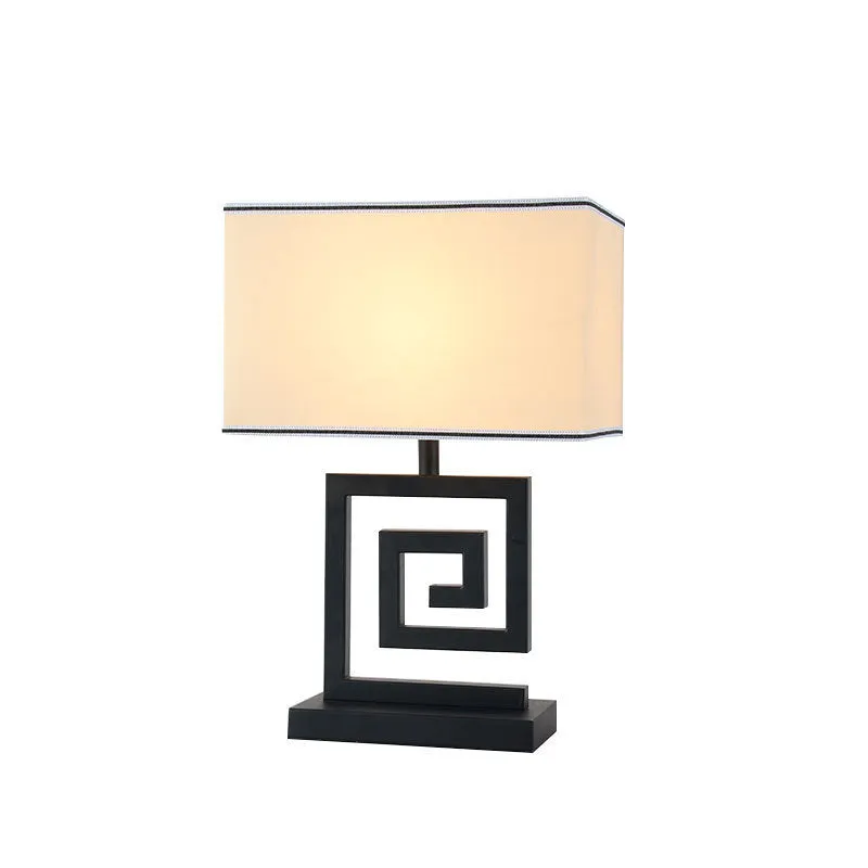 Retro modern Chinese table lamp with fabric lampshade and iron base on wooden side table