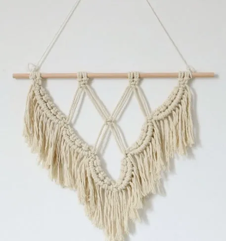 Boho style macrame wall hanging handmade from cotton rope, 40x50cm, pink colour with fringed ends and wooden rod