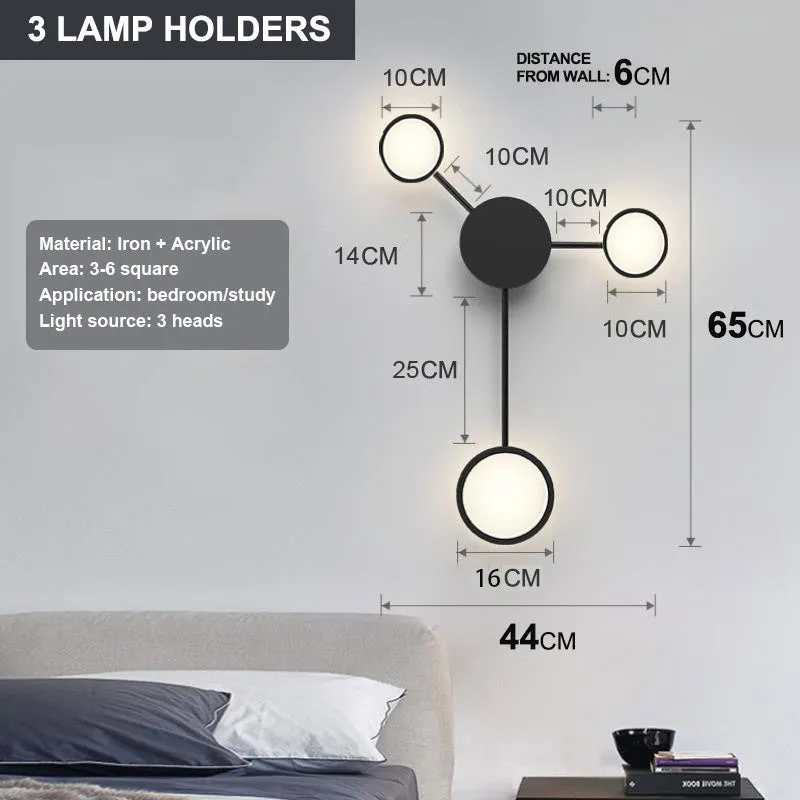 Contracted wall lamp with six heads, iron and acrylic construction, available in black finish mounted on a wall