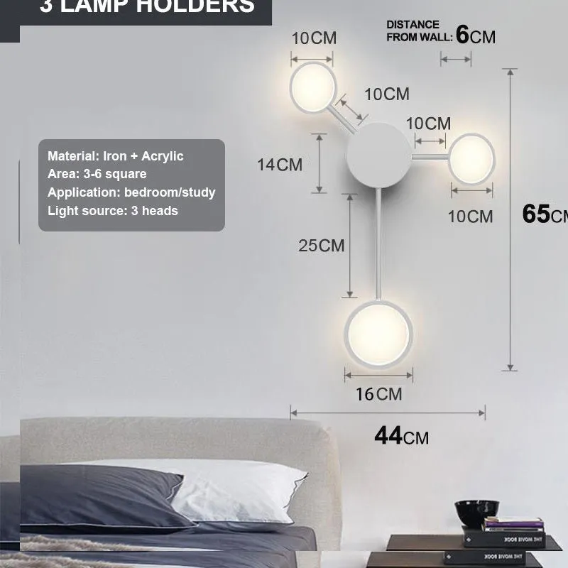 Contracted wall lamp with six heads, iron and acrylic construction, available in black finish mounted on a wall
