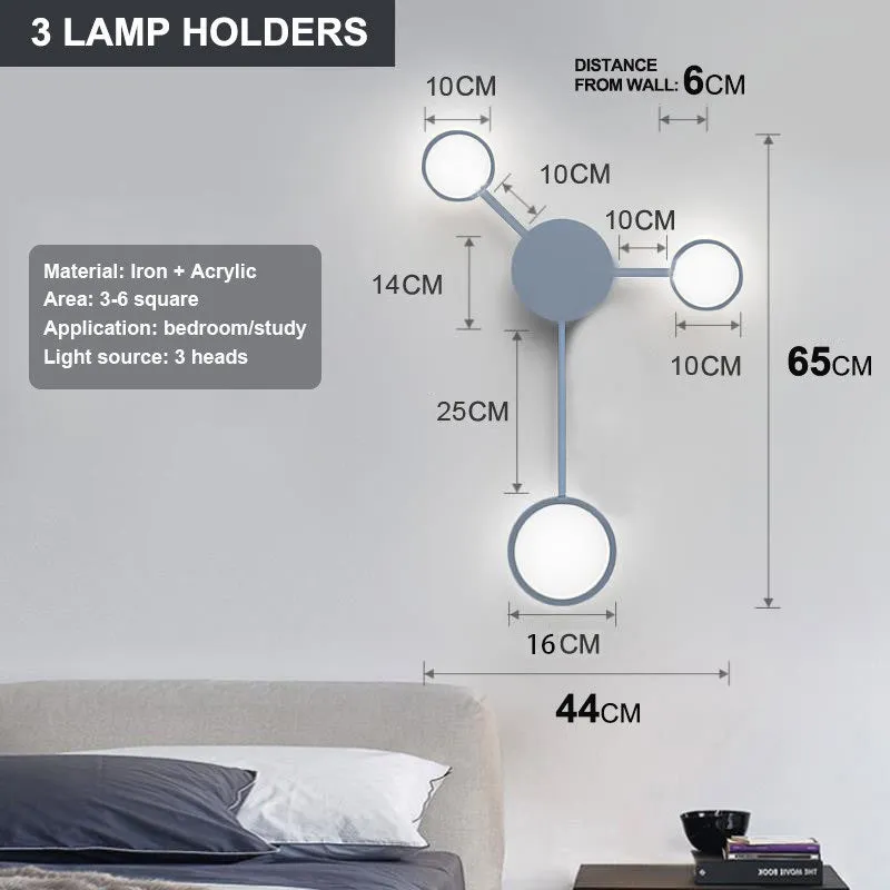 Contracted wall lamp with six heads, iron and acrylic construction, available in black finish mounted on a wall