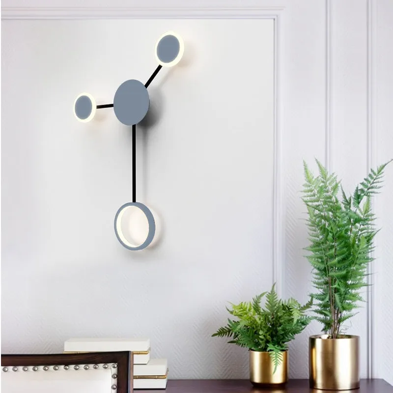 Contracted wall lamp with six heads, iron and acrylic construction, available in black finish mounted on a wall
