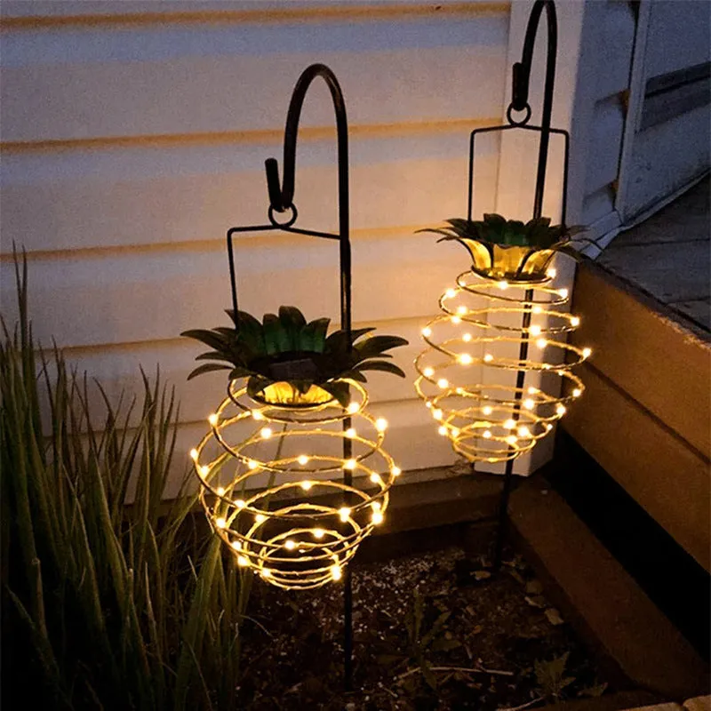 Outdoor solar garden sensor light pineapple shaped LED lamp with IP55 waterproof rating for pathway and patio decoration