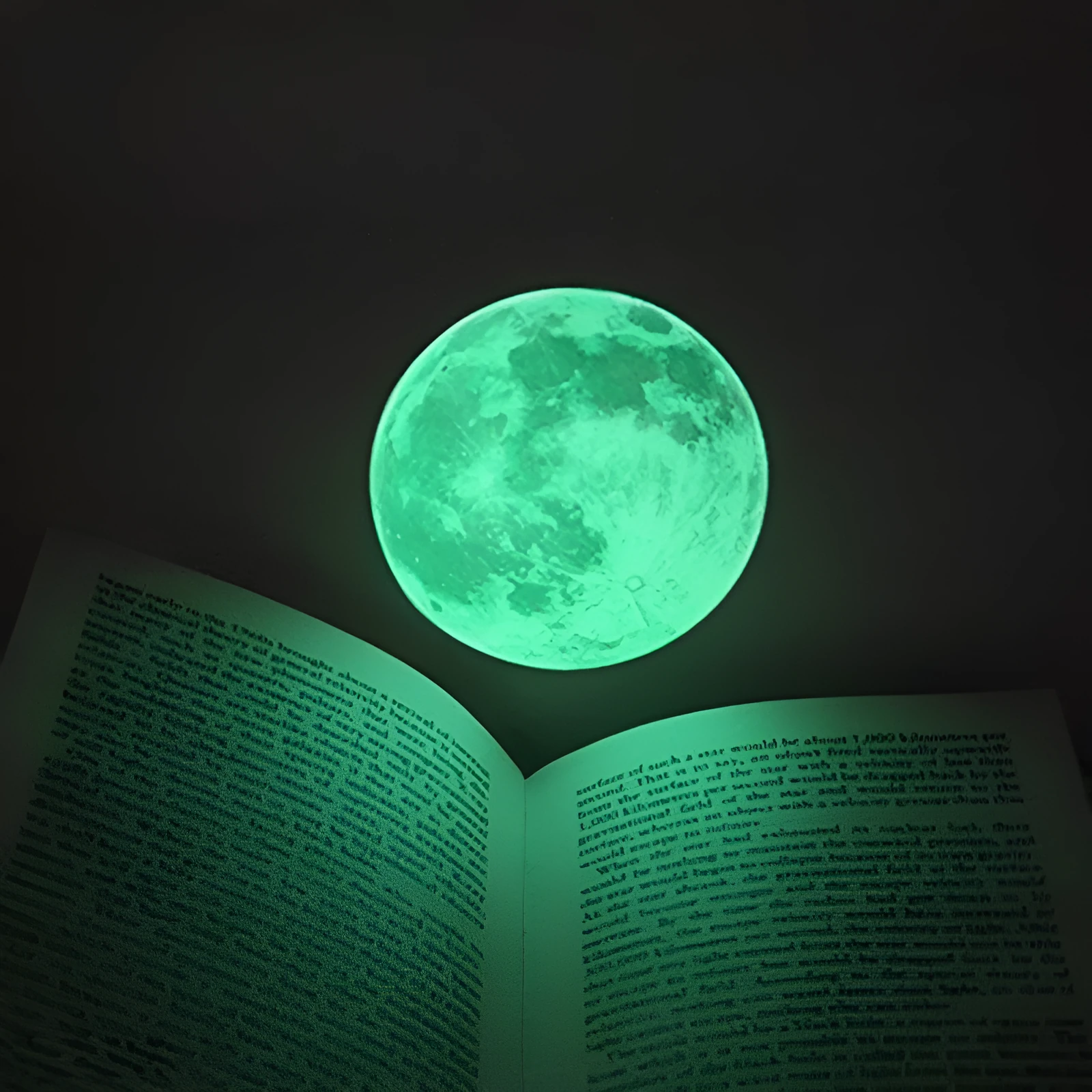 30cm green fluorescent moon wall sticker with super bright glitter finish on a bedroom wall