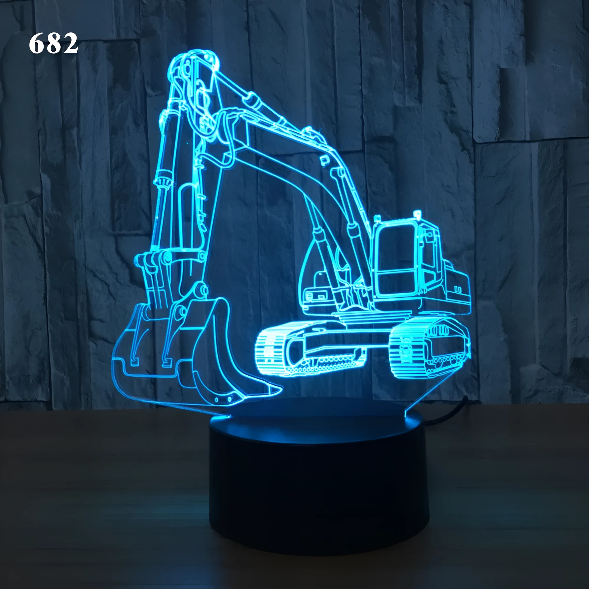 3D night light with acrylic panel showing seven colour gradient modes on a tabletop