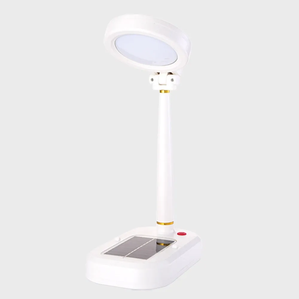 Ivory white solar charging table fan with integrated LED study lamp on a desk