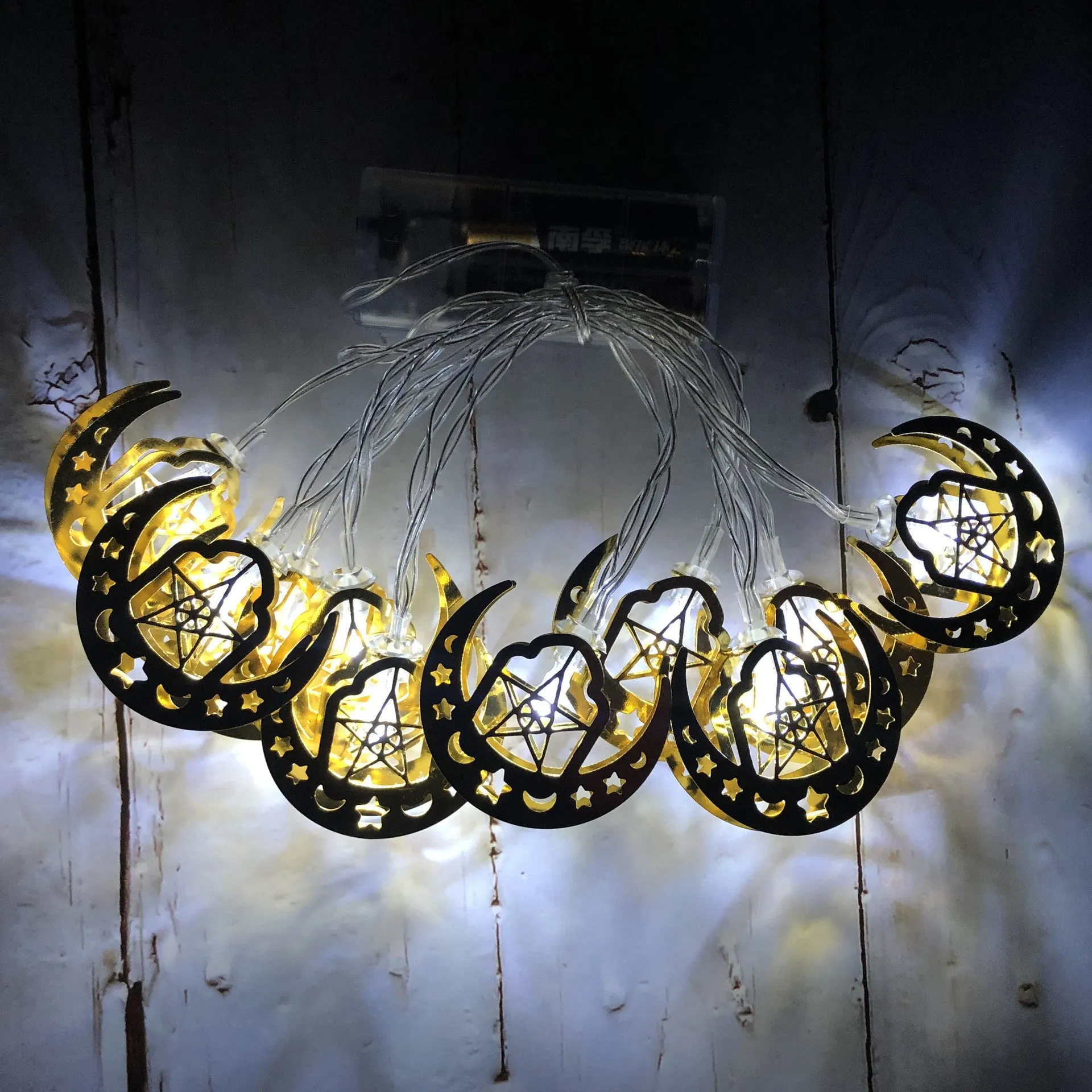 Gold wrought iron moon and star pendant LED string lights for Ramadan or Eid interior decoration