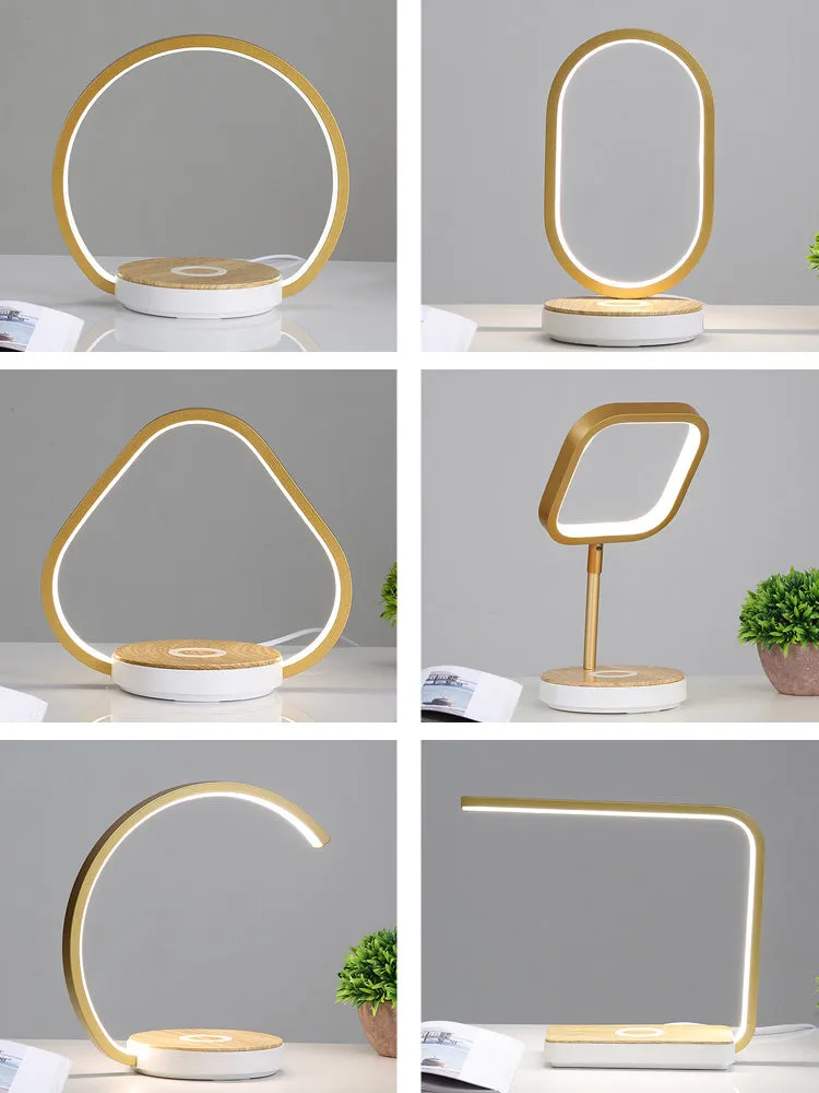 Modern table lamp with wireless charging pad for mobile phone in white finish
