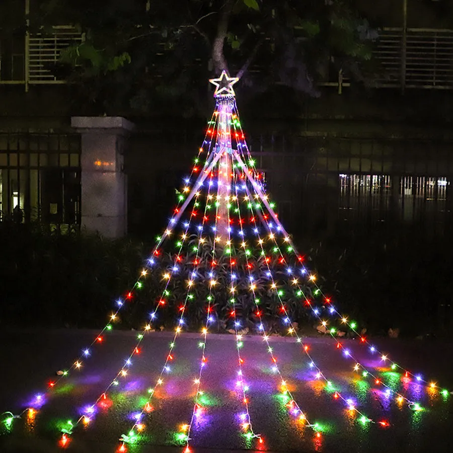 LED five-pointed star waterfall light for outdoor courtyard decoration, 1000mm length, warm white light, on a wooden fence