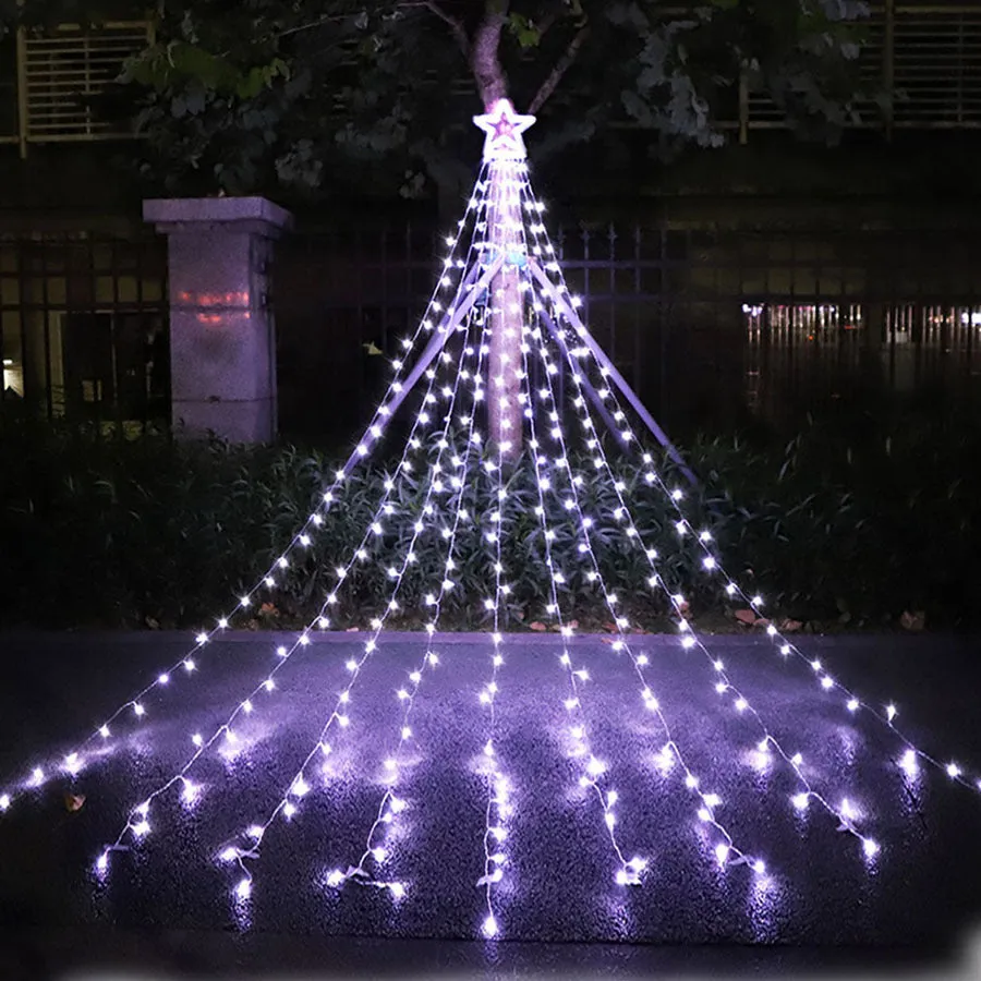 LED five-pointed star waterfall light for outdoor courtyard decoration, 1000mm length, warm white light, on a wooden fence