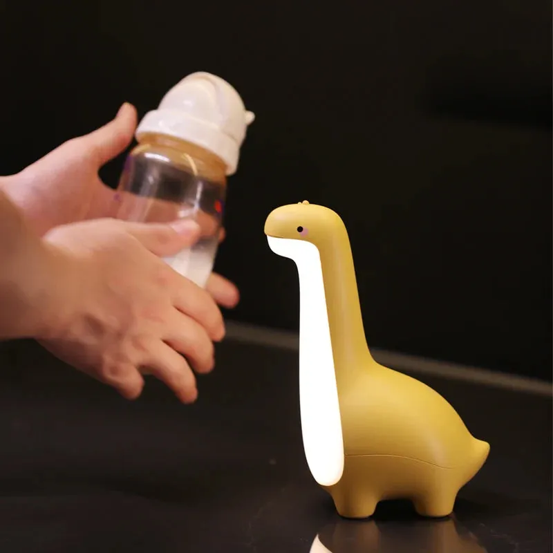 Cute dinosaur night light with 3000K warm glow in lemon yellow, USB rechargeable for kids bedroom decoration