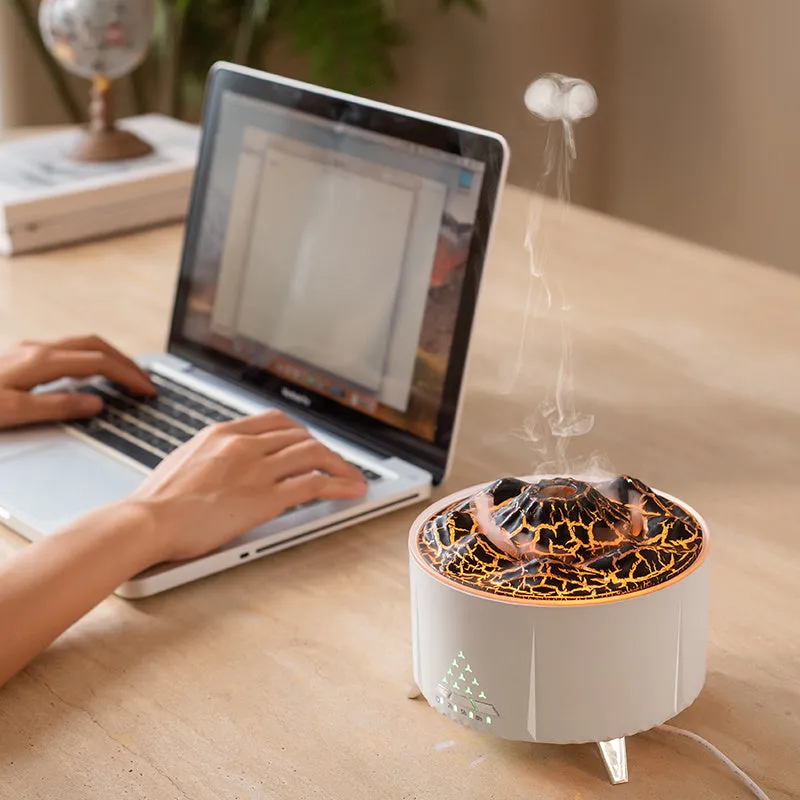 White flame aroma diffuser with Bluetooth speaker and remote control on a table