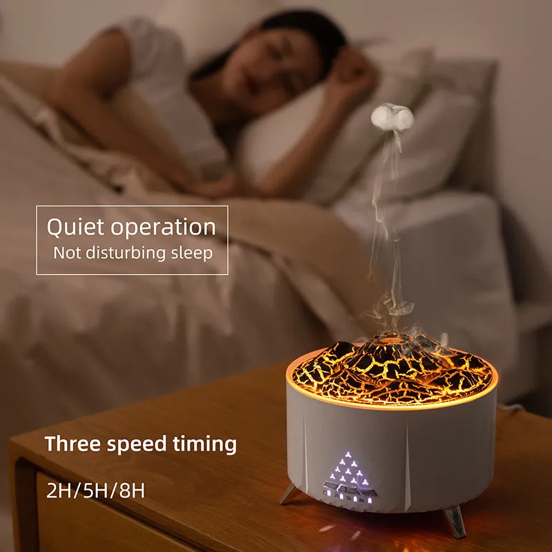 White flame aroma diffuser with Bluetooth speaker and remote control on a table