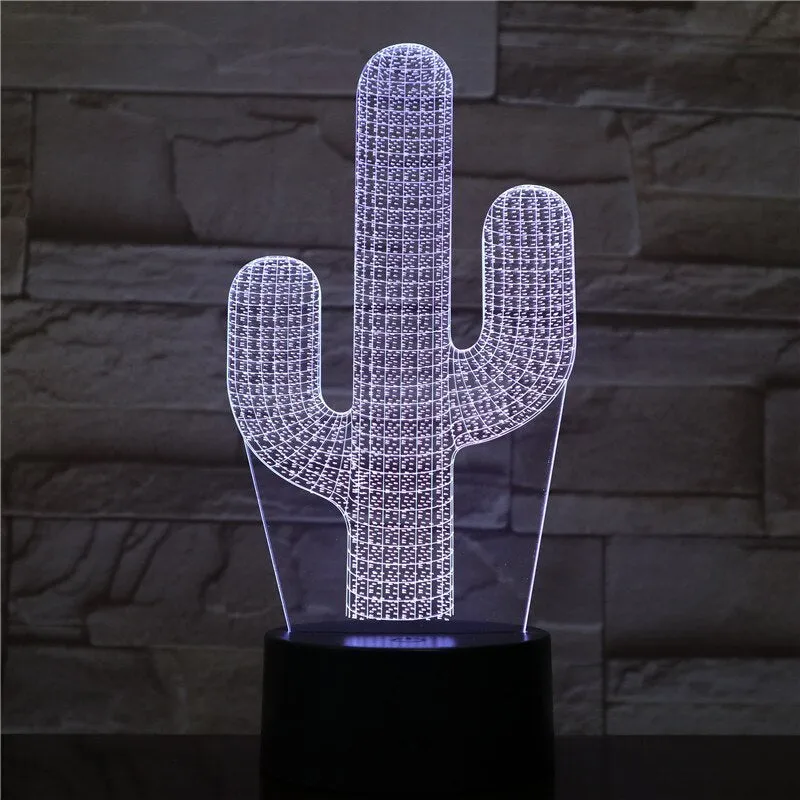 Cactus LED night light with 3D illusion board showing green glow on a table