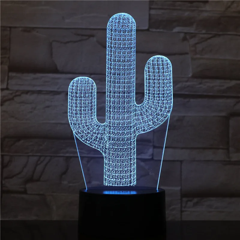 Cactus LED night light with 3D illusion board showing green glow on a table