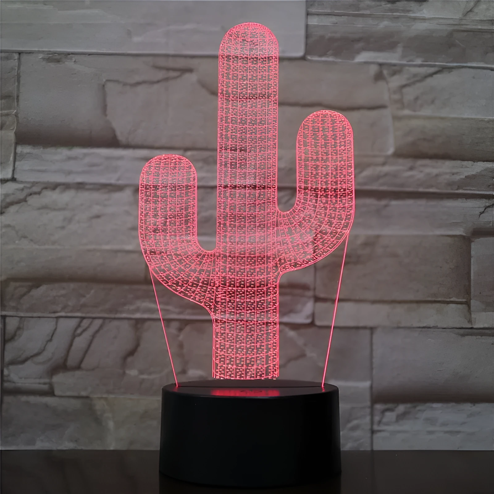 Cactus LED night light with 3D illusion board showing green glow on a table