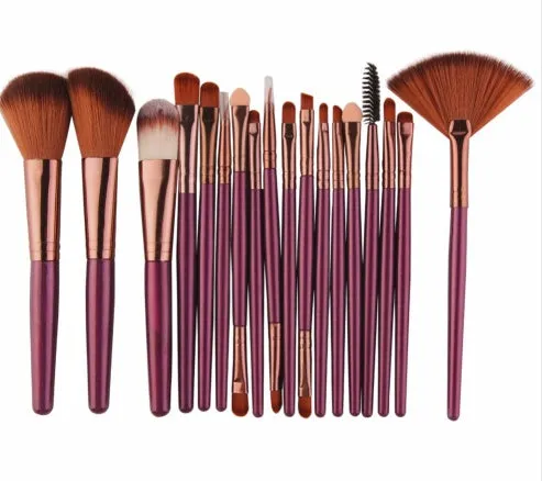MAANGE 18-piece makeup brush and tool set with fan brushes laid out.