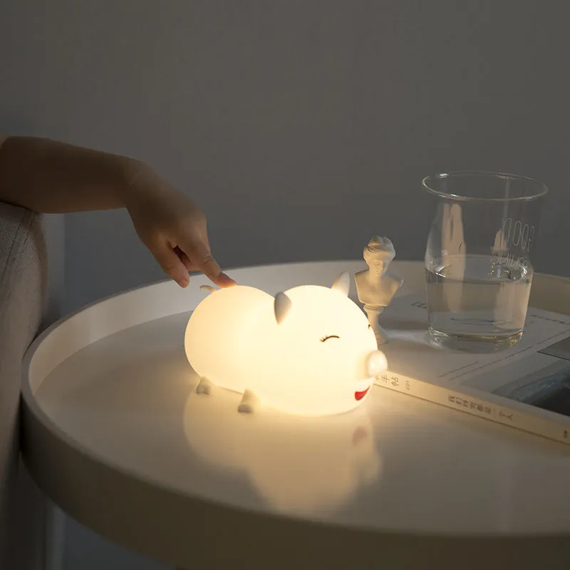 Dudu pig cartoon plastic night light with silicone shade emitting warm yellow and colourful LED glow