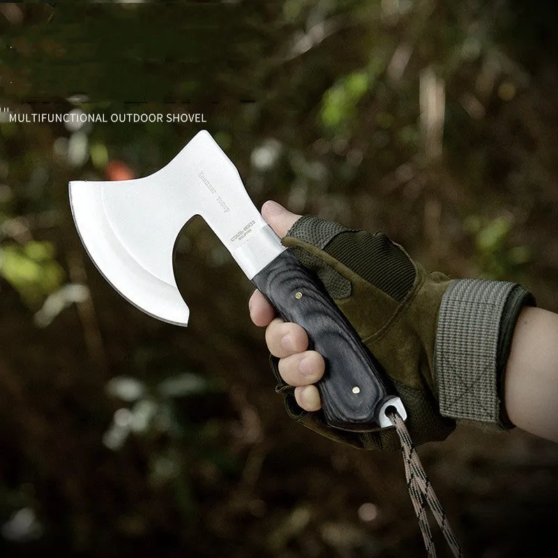 Outdoor Tactics stainless steel axe on ground, 57cm length, 49HRC hardness for wood chopping