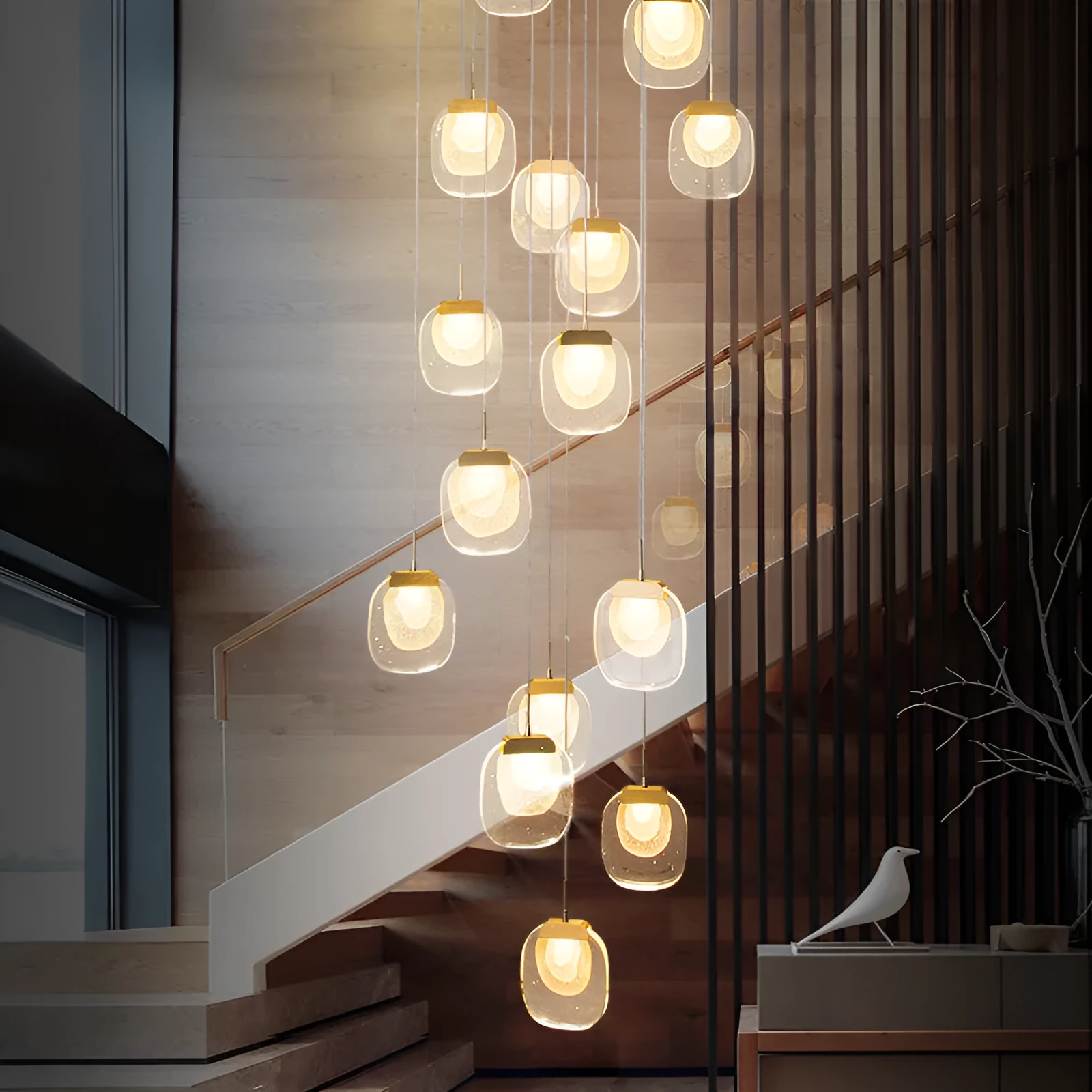 Postmodern crystal chandelier with six gold heads, stainless steel chassis, and adjustable cable on a ceiling