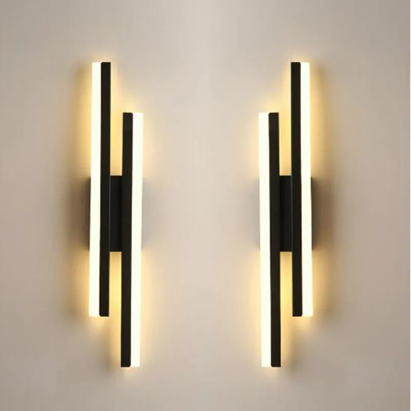 Scandinavian minimalist LED wall light with acrylic lampshade in black or gold finish