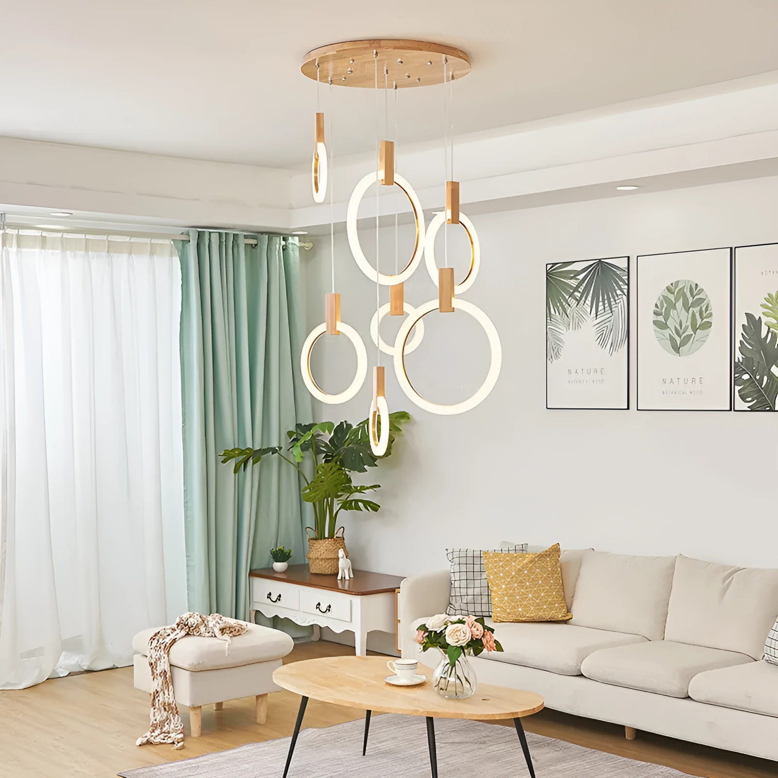 White wooden LED chandelier with three ring sizes 200 300 and 400mm on fishing line suspension for living room
