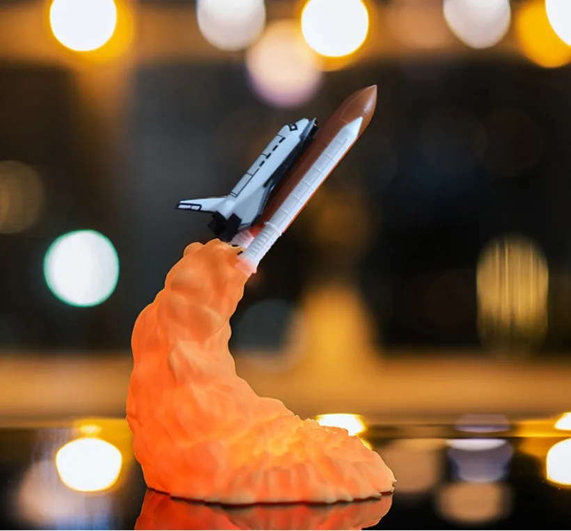 3D print rocket space shuttle lamp night light, 11 inch, PLA material, USB rechargeable, on display in a bedroom