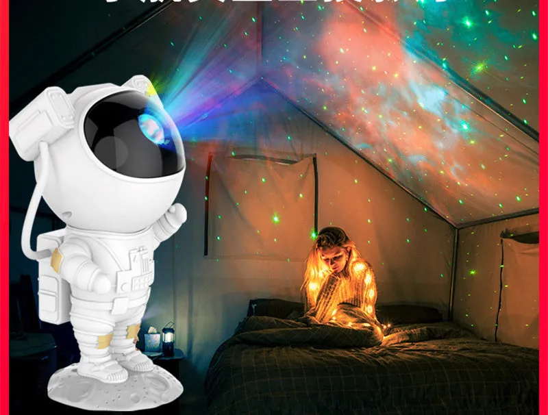 Small astronaut-shaped night light projecting starry laser atmosphere with white light, PVC shade, USB powered