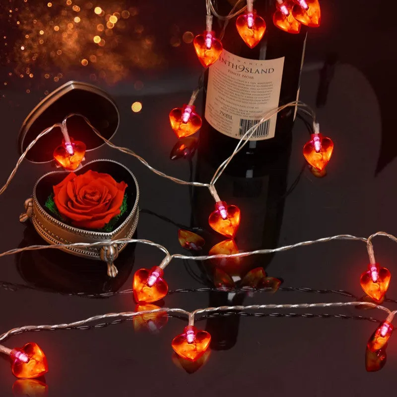 Love Lamp LED string lights with red plastic lamps, battery operated, IP43 rated, 2800 lumens